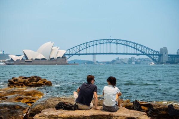 Mrs Macquaries Point, Sydney Harbour Couple enjoying scenic views of Sydney Harbour from Mrs Macquaries Point.